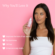Model holding Lash Therapy Hair Boosting Peptide Serum for thicker, healthier hair